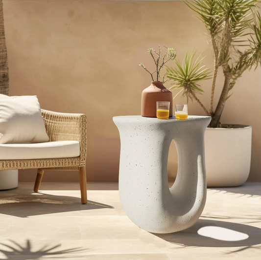 light concrete nordic U shaped side accent table in white with speckle patterns all over. Curvature is very smooth.