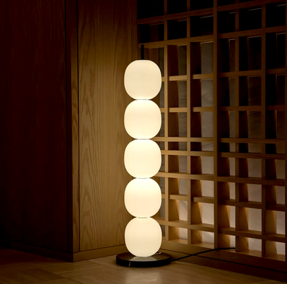floor and table lamp option sizes. Night mood lamp has 2 to 5 circular soft edged gourd shapes stacked on eachother with a black robust steel frame. night lamp sets the tone/mood of the night with its light temperature option